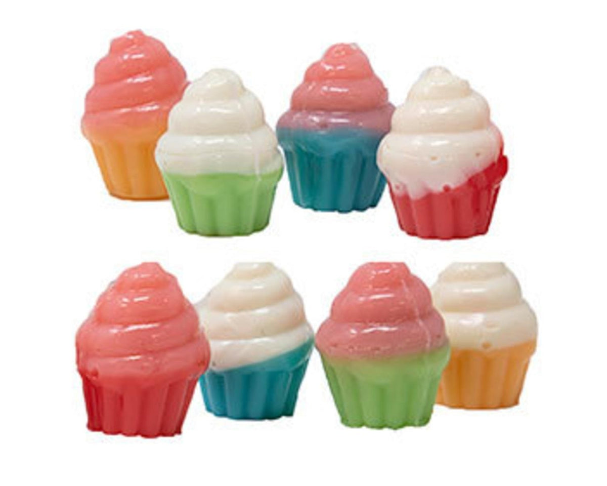 Colorful cupcake-shaped gummy candy on a white background