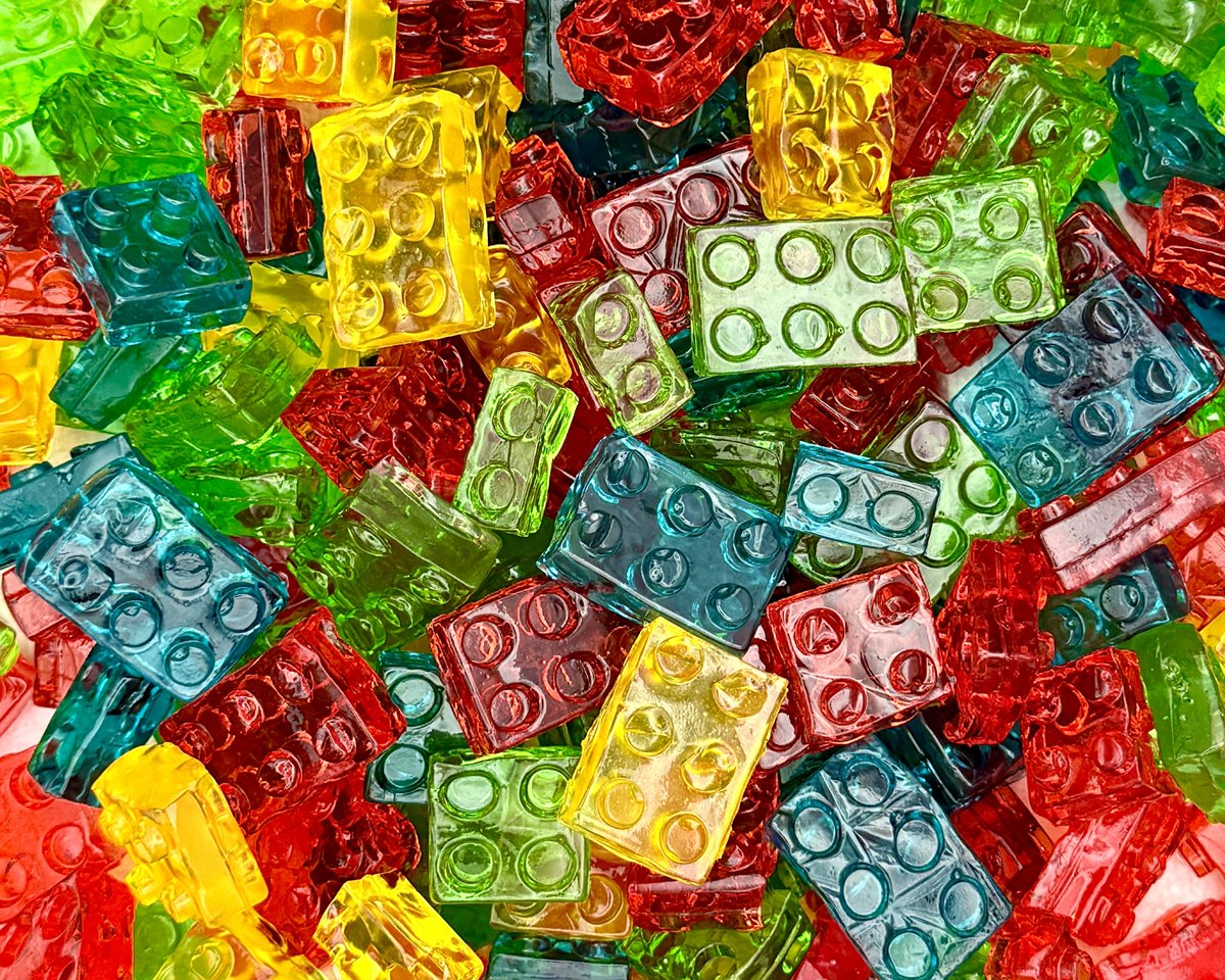 Colorful gummy candy shaped like building blocks.