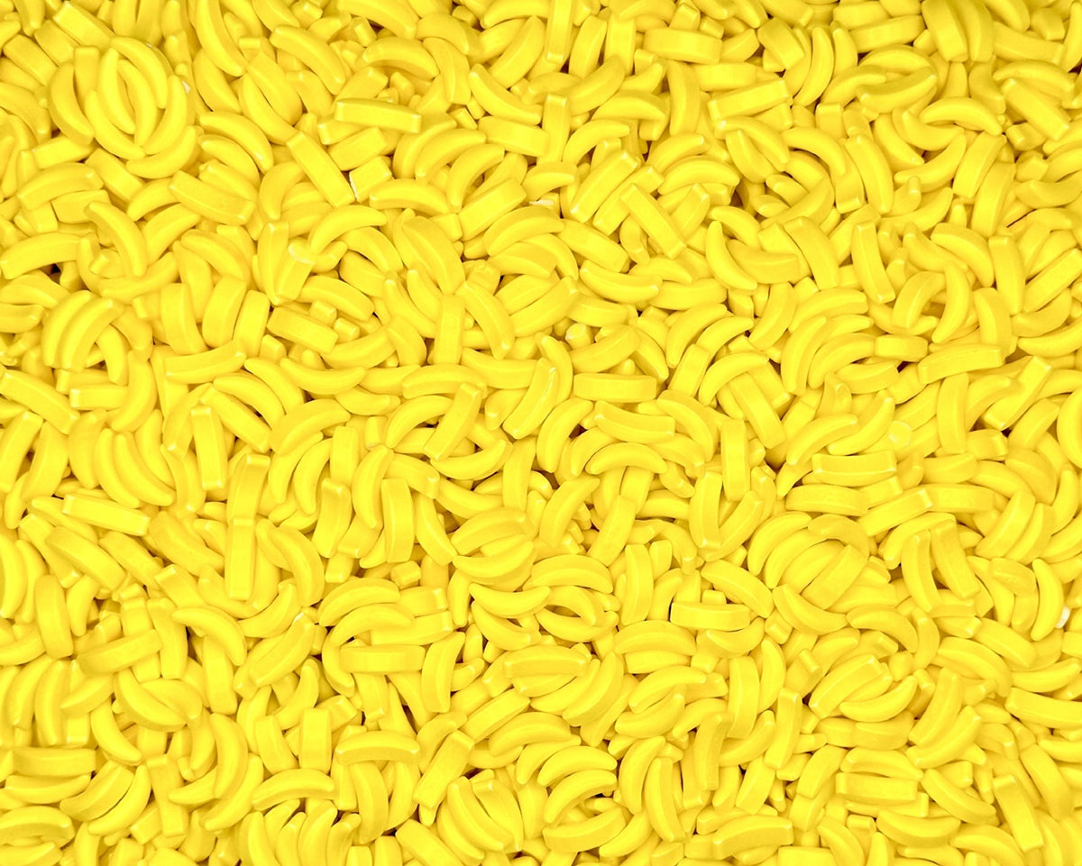 Close-up of a large pile of yellow banana candy