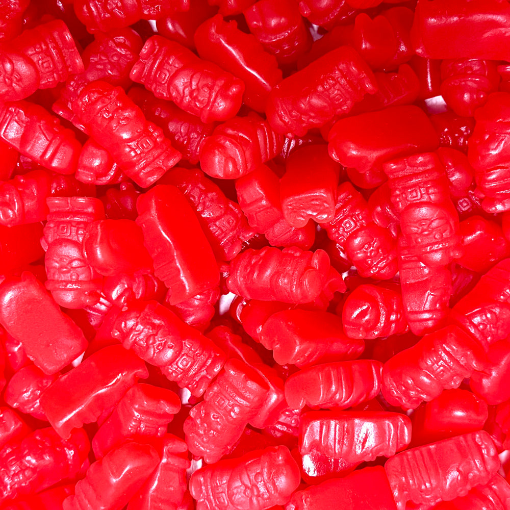 Close-up of red cinnamon gummySantas