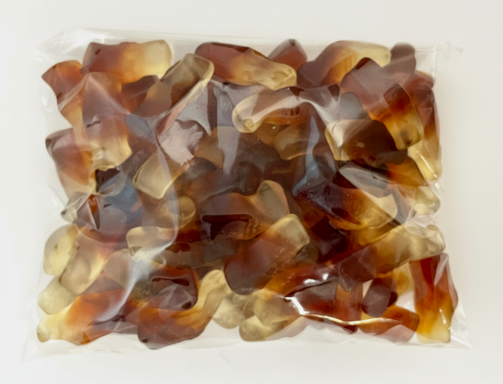 
                      
                        Gummi Cola Flat Bags 
                      
                    