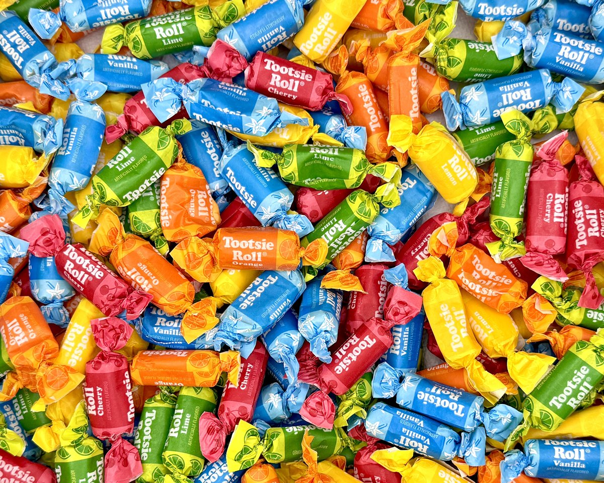 Assorted Tootsie Roll candies in various flavors and colors.